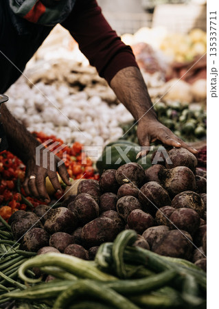 Fresh Seasonal Vegetables At Traditional Market Stall: Artichokes, Beans, Cabbage, Zuccini, Potatoes, And Root Vegetables Displayed In Abundant Mediterranean Food Market Scene 135337711