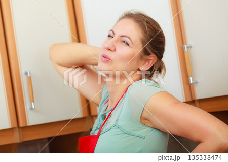 Woman suffering from backache back pain. 135338474