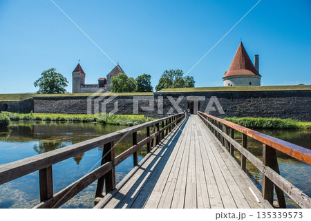 Wooden bridge leading to the main gate of the medieval Kuressaare Castle. 135339573
