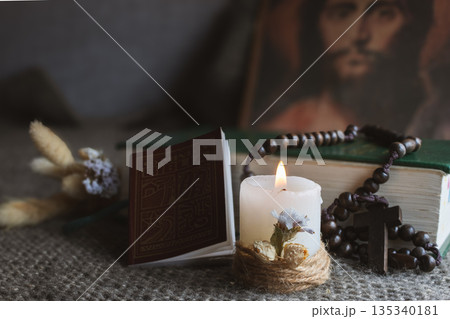 Religious items arranged on a knitted surface representing spirituality and Christian traditions Religious items arranged on a knitted surface representing spirituality and Christian traditions 135340181