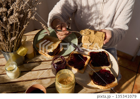 Breakfast Toast With Peanut Butter And Jam: Cozy Morning Table Scene 135341079