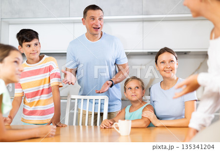 Big family discussing 135341204