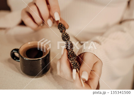 Candy Coffee Hands Woman Cozy Winter Beverage Enjoying Sweet Treat Candy Coffee Hands Woman Cozy Winter Beverage Enjoying Sweet Treat 135341500