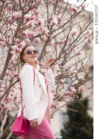 Woman Magnolia Blossom Springtime 135341537