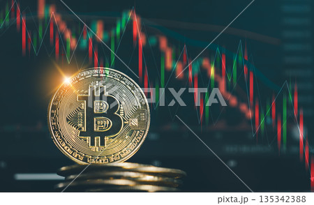 A shiny gold Bitcoin coin stacked on other coins, set against a dark background with red and green candlestick charts illustrating a volatile cryptocurrency market downtrend. A shiny gold Bitcoin coin stacked on other coins, set against a dark background with red and green candlestick charts illustrating a volatile cryptocurrency market downtrend. 135342388