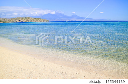 Beautiful view of white sand beach and blue sky 135344189