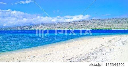 Beautiful view of white sand beach and blue sky 135344201