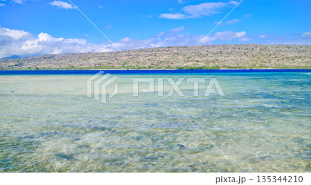 Beautiful view of white sand beach and blue sky Beautiful view of white sand beach and blue sky 135344210