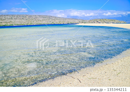 Beautiful view of white sand beach and blue sky Beautiful view of white sand beach and blue sky 135344211