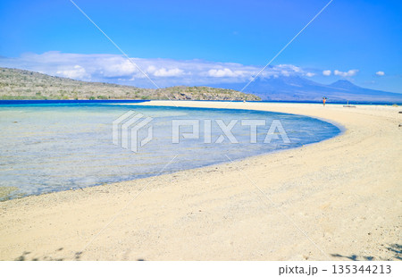 Beautiful view of white sand beach and blue sky 135344213