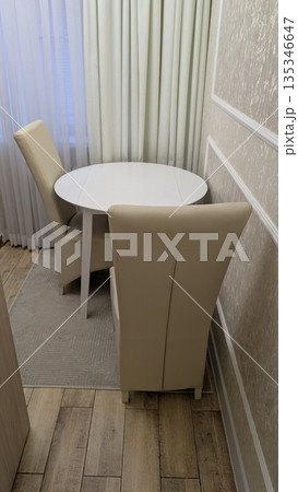 Small apartment dining area with contemporary design and soft lighting Small apartment dining area with contemporary design and soft lighting 135346647