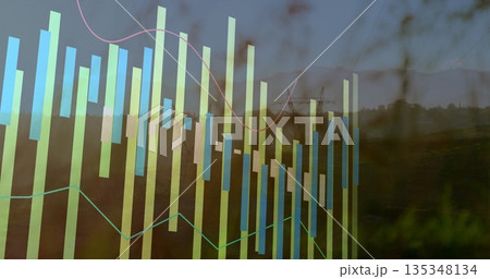 Displaying data overlay on hillside, with translucent bars, pink and green lines, crane silhouette 135348134