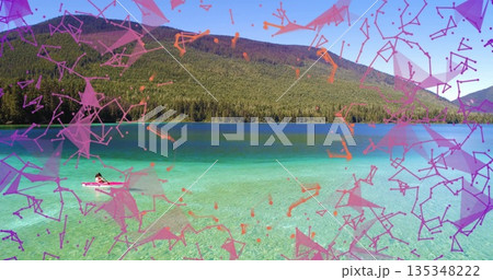 Paddling woman in life vest crossing mountain lake on pink kayak, digital overlay, copy space Paddling woman in life vest crossing mountain lake on pink kayak, digital overlay, copy space 135348222