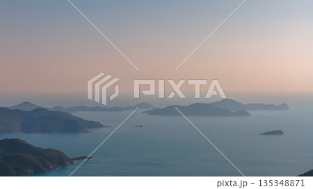 Serene Coastal Mountain Range Over Port Shelter Serene Coastal Mountain Range Over Port Shelter 135348871