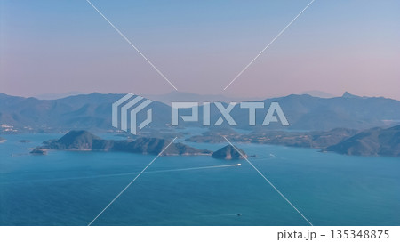 Serene Coastal Mountain Range Over Port Shelter 135348875