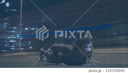 Crawling woman wearing jacket and pants across asphalt street near guardrail at night, grid overlay 135350042