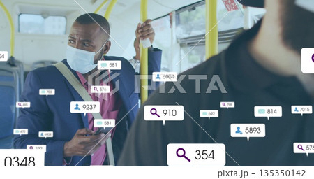 Holding smartphone, Black man wearing face mask gripping handrail on bus, with icons, copy space 135350142