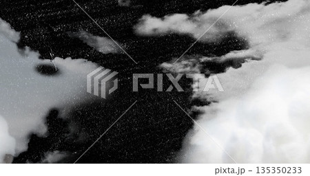 Displaying dark cloud mass dividing gray and white clouds overhead, with stormy texture Displaying dark cloud mass dividing gray and white clouds overhead, with stormy texture 135350233