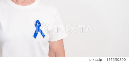 Elderly with dark Blue or Navy blue Ribbon for concept of March Colorectal and Colon Cancer Awareness month, May Arthritis awareness, July Juvenile arthritis and Childhood. Health and world cancer day 135350890