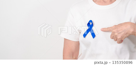Elderly with dark Blue or Navy blue Ribbon for concept of March Colorectal and Colon Cancer Awareness month, May Arthritis awareness, July Juvenile arthritis and Childhood. Health and world cancer day Elderly with dark Blue or Navy blue Ribbon for concept of March Colorectal and Colon Cancer Awareness month, May Arthritis awareness, July Juvenile arthritis and Childhood. Health and world cancer day 135350896