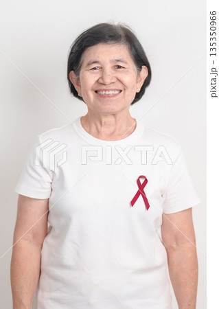 Elderly with Burgundy Ribbon for March Multiple Myeloma Cancer Awareness month, September Sickle Cell Anemia, Headache and Migraine week, April world Meningitis day, October Hospice  Palliative care 135350966