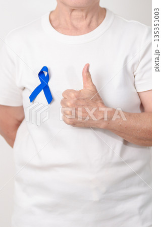Elderly with dark Blue or Navy blue Ribbon for concept of March Colorectal and Colon Cancer Awareness month, May Arthritis awareness, July Juvenile arthritis and Childhood. Health and world cancer day Elderly with dark Blue or Navy blue Ribbon for concept of March Colorectal and Colon Cancer Awareness month, May Arthritis awareness, July Juvenile arthritis and Childhood. Health and world cancer day 135351003