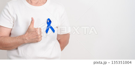 Elderly with dark Blue or Navy blue Ribbon for concept of March Colorectal and Colon Cancer Awareness month, May Arthritis awareness, July Juvenile arthritis and Childhood. Health and world cancer day Elderly with dark Blue or Navy blue Ribbon for concept of March Colorectal and Colon Cancer Awareness month, May Arthritis awareness, July Juvenile arthritis and Childhood. Health and world cancer day 135351004
