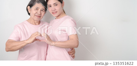 Couple woman with pink Shirt for Pink October Breast Cancer Awareness month, May Women Health, women rights, Empowerment, March International Women day, February Valentine, May International Mother 135351622