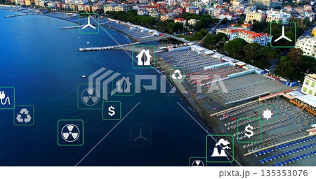 Capturing aerial view of coastal resort with curved bay, loungers, umbrellas, piers, overlay icons Capturing aerial view of coastal resort with curved bay, loungers, umbrellas, piers, overlay icons 135353076