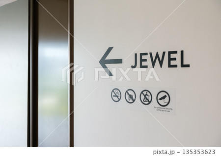 Direction sign for Jewel at Changi Airport showcasing modern design and accessibility features in Singapore 135353623
