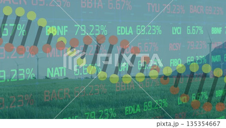 Displaying stock chart overlay highlighting data points and bars over farmland with turbines, silo Displaying stock chart overlay highlighting data points and bars over farmland with turbines, silo 135354667