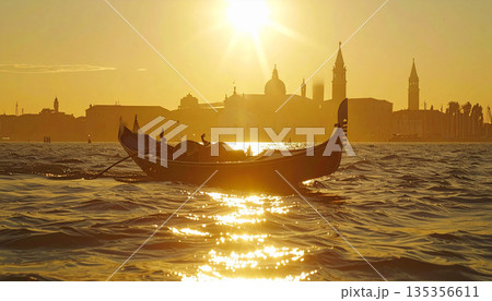 Silhouette of Gondola Boat at Sea During Golden Hour Sunset in Venice 135356611
