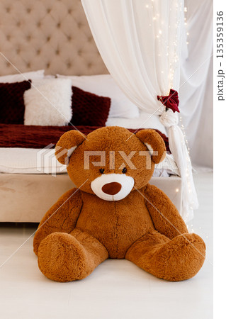 Cute Teddy Bear in Cozy Bedroom Interior 135359136