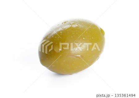 Fresh green olive on white background with water droplets and natural shine 135361494