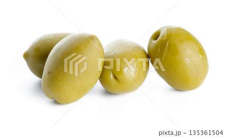 Green olives on a white background for culinary uses and decoration ideas Green olives on a white background for culinary uses and decoration ideas 135361504