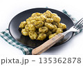 Gnocchi with pesto sauce 135362878