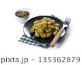 Gnocchi with pesto sauce 135362879