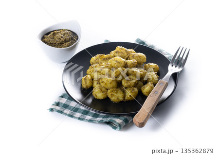 Gnocchi with pesto sauce Gnocchi with pesto sauce 135362879