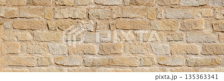 Old dry stone wall texture background showing masonry pattern Old dry stone wall texture background showing masonry pattern 135363341