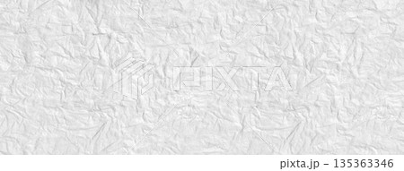 Crumpled white paper creating a textured surface background Crumpled white paper creating a textured surface background 135363346