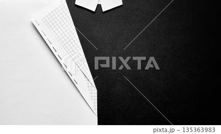 Minimal paper jacket shape with stitched edge flat lay. Minimal paper jacket shape with stitched edge flat lay. 135363983