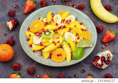Fresh Fruit Salad on Kitchen Table Fresh Fruit Salad on Kitchen Table 135364217