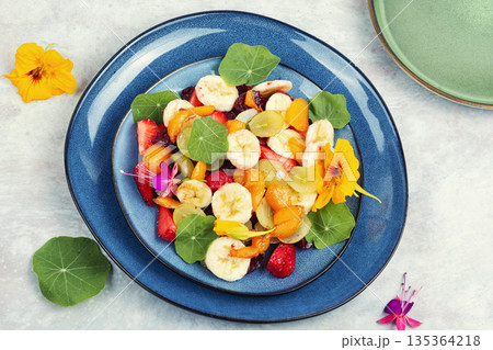 Fresh Fruit Salad on Kitchen Table Fresh Fruit Salad on Kitchen Table 135364218