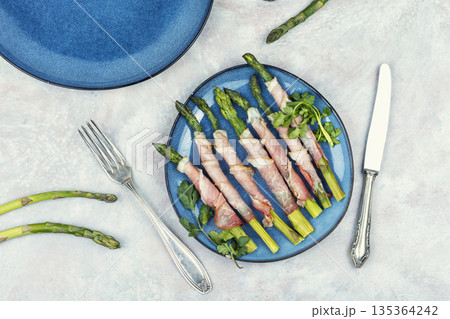 Asparagus with Meat on a Plate 135364242