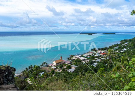 Aerial view of Vaiea village and church in Maupiti, French Polynesia 135364519