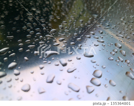 Shiny Stainless Steel Surface With Water Droplets: Closeup Macro Abstract Reflection 135364801