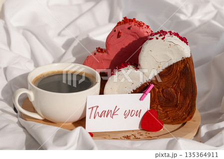 THANK YOU caption on paper note thanksgiving Morning breakfast in bed in wooden tray Present gift idea Valentine's Day Holiday celebration Heart shaped croissants. Puff pastry new trendy sweet dessert THANK YOU caption on paper note thanksgiving Morning breakfast in bed in wooden tray Present gift idea Valentine's Day Holiday celebration Heart shaped croissants. Puff pastry new trendy sweet dessert 135364911