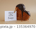 Enjoy little things saying caption on greeting card Delightful heartshaped pastry croissant treat, beautifully topped with colorful frosting galore. Copy space. Food experimentation viral dessert 135364970