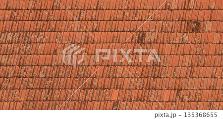 Weathered red terracotta roof tiles texture pattern 135368655