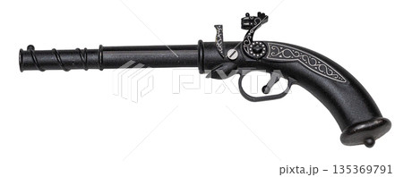 Black antique flintlock pistol with ornate details 135369791